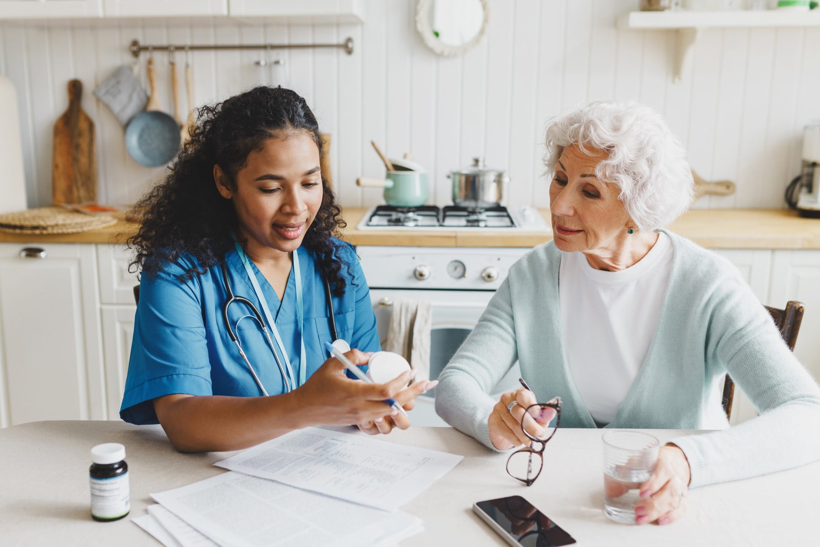 Grandmere Premier Healthcare Staff assisting with medication